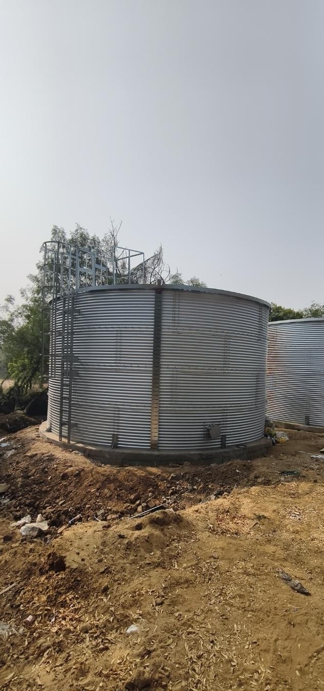 Zincalume bolted fire-water storage tank under erection
